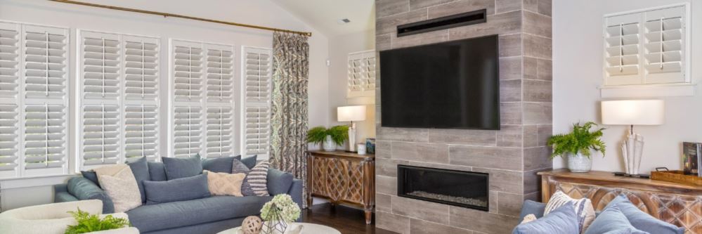 Plantation shutters in a Kanab family room with fireplace