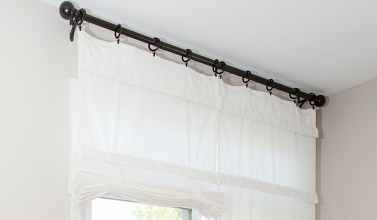 Tumble shades in St. George give your doors privacy versatility and style. White tumble shade on double glass doors